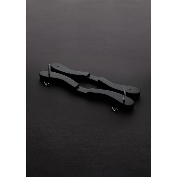 Schwarzer Holzfesselblock